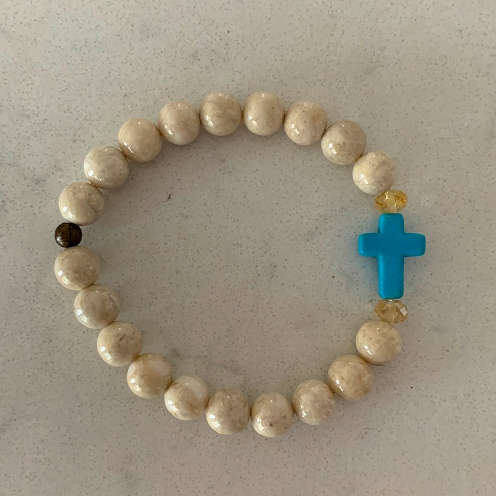 Natural stone and blue cross bracelet.